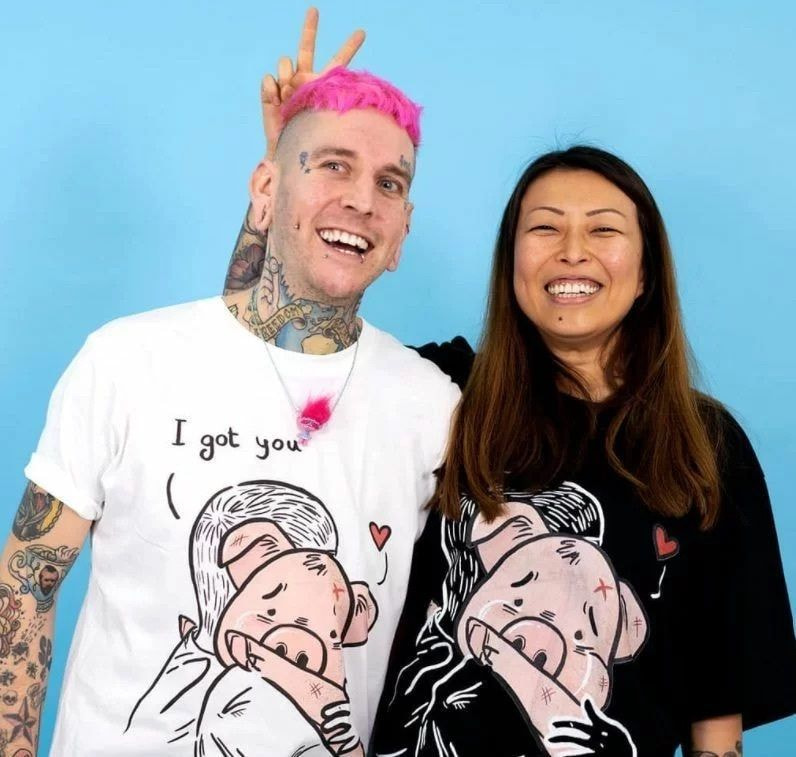 a man and woman posing for a picture