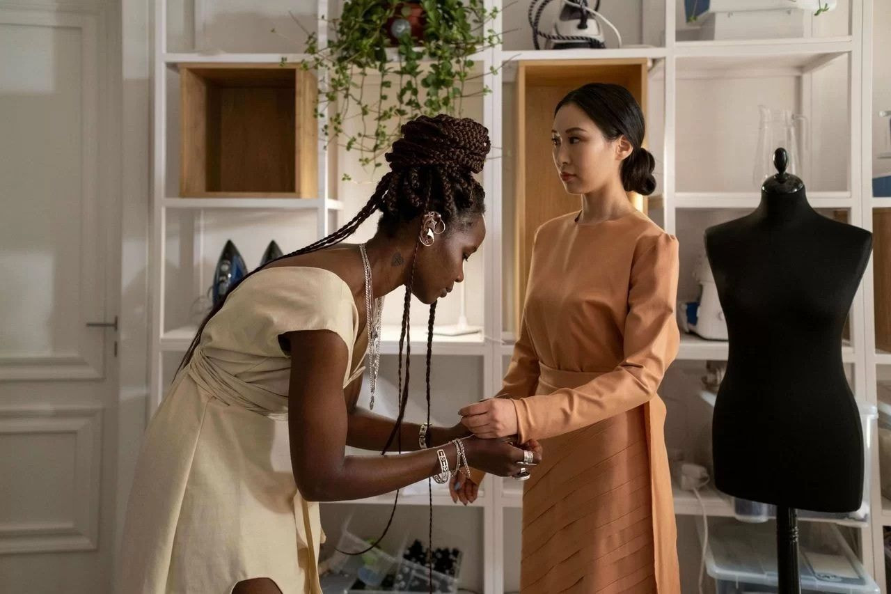 a woman holding a woman's hand